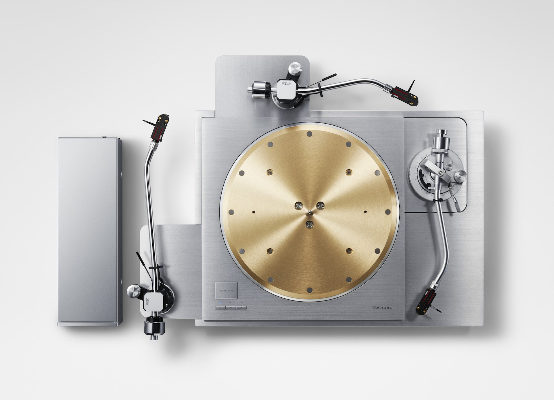 Technics SL-1000R-skivspelare med elegant design och guldfärgade samt silverfärgade detaljer.